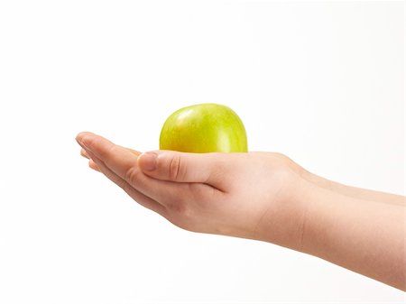 simsearch:400-04586134,k - Apple in the palms og childs hands - on white background Stock Photo - Budget Royalty-Free & Subscription, Code: 400-05911034