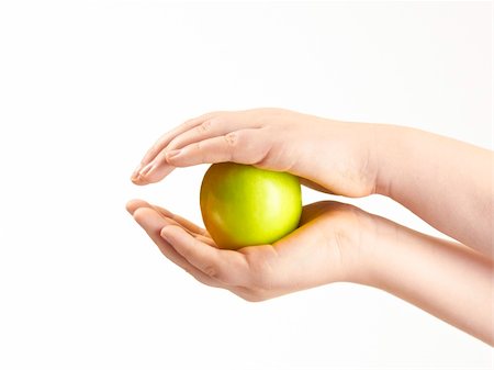 simsearch:400-04586134,k - Apple sandwiched between childs hands - on white background Stock Photo - Budget Royalty-Free & Subscription, Code: 400-05911033