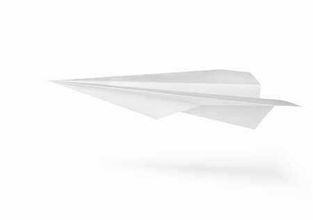 shadow plane - Plane made of a paper isolated on a white background Stock Photo - Budget Royalty-Free & Subscription, Code: 400-05911128