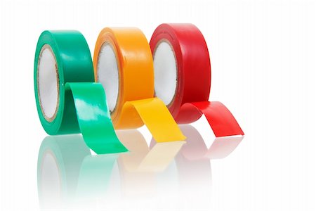 Three colors insulating tapes isolated on white with reflections Stock Photo - Budget Royalty-Free & Subscription, Code: 400-05911558