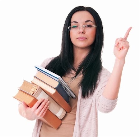 simsearch:400-04860880,k - Young woman with books draws attantion isolated on white background Stock Photo - Budget Royalty-Free & Subscription, Code: 400-05911760