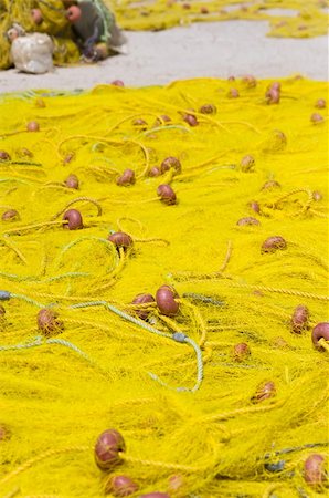 simsearch:400-05254289,k - Yellow fishing nets stretched in the sun Stock Photo - Budget Royalty-Free & Subscription, Code: 400-05925628