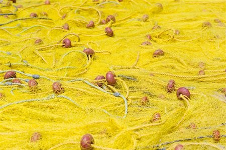 simsearch:400-05254289,k - Yellow fishing nets stretched in the sun Stock Photo - Budget Royalty-Free & Subscription, Code: 400-05925656