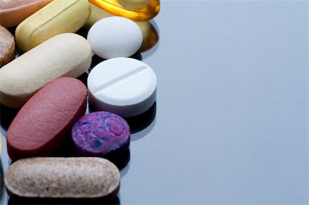 a cocktail of various tablets and pills, drugs and health supplements. Stock Photo - Budget Royalty-Free & Subscription, Code: 400-05928828