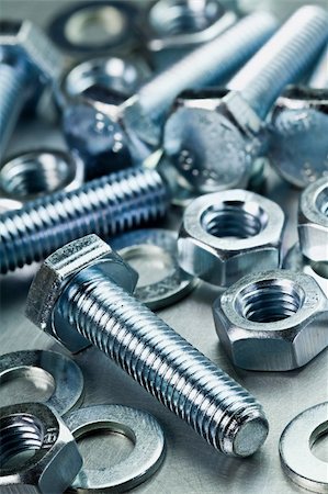simsearch:400-05240852,k - Screws, nuts, washers on a metal table. Stock Photo - Budget Royalty-Free & Subscription, Code: 400-05947532