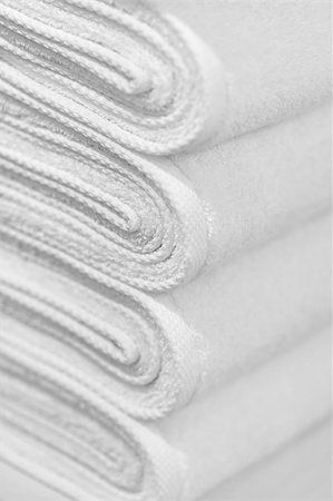 A stack of new white towels close-up - the background Photographie de stock - Aubaine LD & Abonnement, Code: 400-06064217