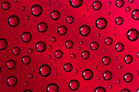 fresh air background - Water drops on glass texture over red background Photographie de stock - Aubaine LD & Abonnement, Code: 400-06065774