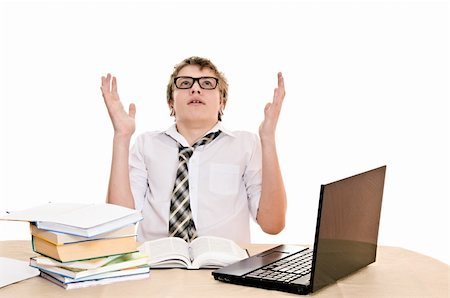 simsearch:400-04704759,k - teenager student sits behind a desk isolated on white background Stock Photo - Budget Royalty-Free & Subscription, Code: 400-06065870