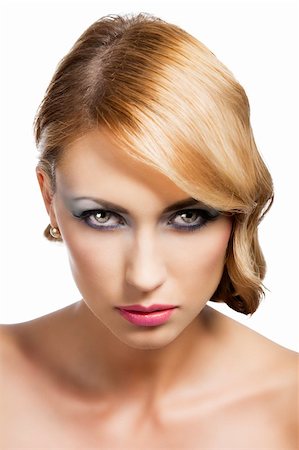 simsearch:877-07460478,k - blond beautiful woman with strong make up and an old fashion hair stylish in beauty portrait close up, she is in front of the camera, looks in to the lens with actractive expression Stock Photo - Budget Royalty-Free & Subscription, Code: 400-06067011