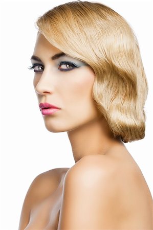 simsearch:877-07460478,k - blond beautiful woman with strong make up and an old fashion hair stylish in beauty portrait close up. she is turned to the right and looks in to the lens. Stock Photo - Budget Royalty-Free & Subscription, Code: 400-06067013