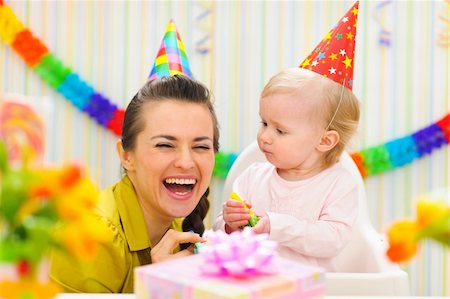 Happy mother celebrating first birthday of her baby Stock Photo - Budget Royalty-Free & Subscription, Code: 400-06067054