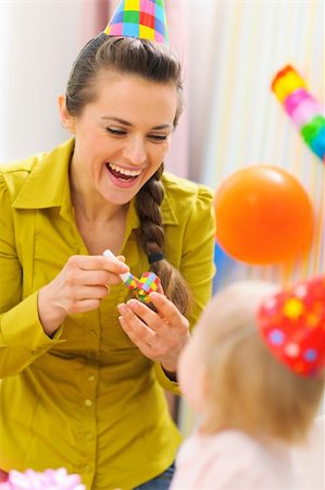 Mother celebrating first birthday of her baby Stock Photo - Budget Royalty-Free & Subscription, Code: 400-06067052