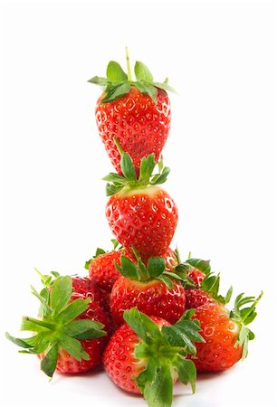 simsearch:400-05370991,k - A picture of a tower of strawberries with a ground of strawberries Stock Photo - Budget Royalty-Free & Subscription, Code: 400-06067486