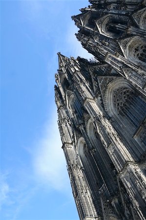 simsearch:400-07771401,k - gothic architecture of the cologne cathedral in germany against a blue sky Photographie de stock - Aubaine LD & Abonnement, Code: 400-06068005