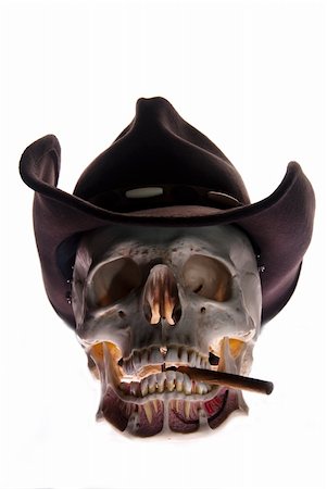 picture of a scary skeleton head - Skull with hat and cigarett, non smoking concept Stock Photo - Budget Royalty-Free & Subscription, Code: 400-06068018