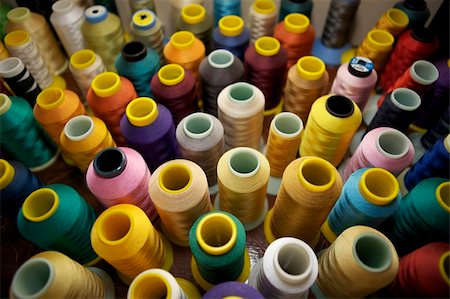 factory fashion - Looking down at spools of thread. Stock Photo - Budget Royalty-Free & Subscription, Code: 400-06069934