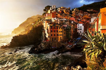 Sunset stormy light in Riomaggiore, Cinque Terre, Italy Stock Photo - Budget Royalty-Free & Subscription, Code: 400-06060686