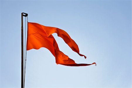 Rusty flag pole with saffron coloured flag a symbolic emblem of a Hindu Temple Stock Photo - Budget Royalty-Free & Subscription, Code: 400-06061146