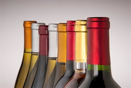 simsearch:400-04226436,k - Wine bottle necks with limited depth of field on black Stock Photo - Budget Royalty-Free & Subscription, Code: 400-06061250