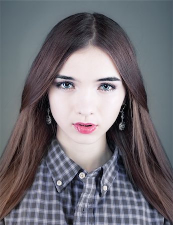 young beautiful woman studio portrait Stock Photo - Budget Royalty-Free & Subscription, Code: 400-06062236