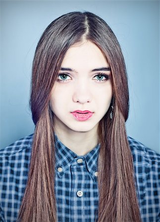 young beautiful woman studio portrait Stock Photo - Budget Royalty-Free & Subscription, Code: 400-06062237