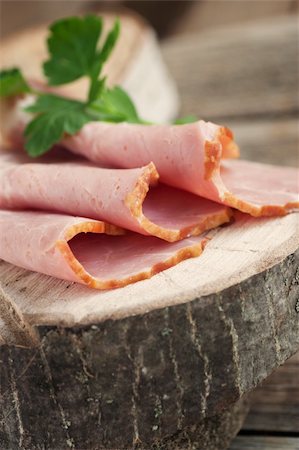 simsearch:400-06207145,k - Fresh pork ham with garnish on wooden background Stock Photo - Budget Royalty-Free & Subscription, Code: 400-06063216