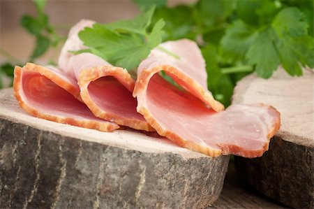 simsearch:400-06207145,k - Fresh pork ham with garnish on wooden background Stock Photo - Budget Royalty-Free & Subscription, Code: 400-06063217
