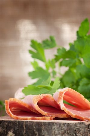 simsearch:400-06207145,k - Fresh pork ham with garnish on wooden background Stock Photo - Budget Royalty-Free & Subscription, Code: 400-06063218