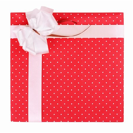 simsearch:400-04304378,k - Little red gift with ribbon isolated on white background Photographie de stock - Aubaine LD & Abonnement, Code: 400-06063235