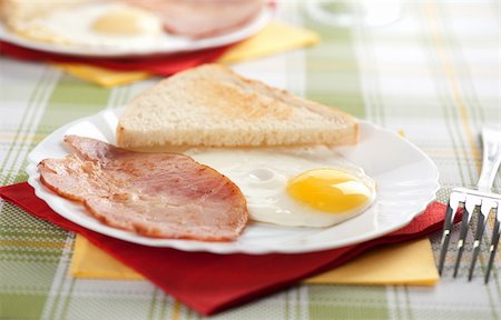 Breakfast. Eggs, toasts and bacon Stock Photo - Budget Royalty-Free & Subscription, Code: 400-06063277