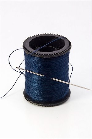 simsearch:6109-08701535,k - Blue spool of thread on a white background. Stock Photo - Budget Royalty-Free & Subscription, Code: 400-06063457