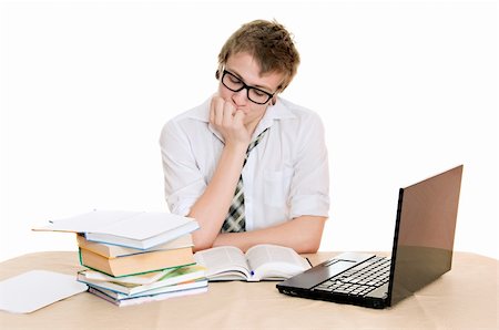 simsearch:400-04704759,k - teenager student sits behind a desk isolated on white background Stock Photo - Budget Royalty-Free & Subscription, Code: 400-06063560