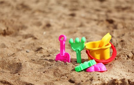 Plastic toys for the kids on the beach Stock Photo - Budget Royalty-Free & Subscription, Code: 400-06074794