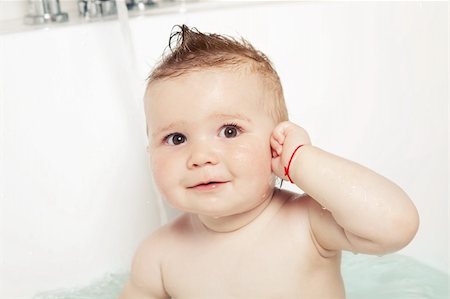 simsearch:400-04071604,k - Cute baby showing "where the ear is" and smiling while taking a bath Stock Photo - Budget Royalty-Free & Subscription, Code: 400-06075949