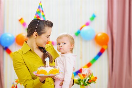 Portrait of baby and mother with birthday party cake Stock Photo - Budget Royalty-Free & Subscription, Code: 400-06076015