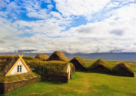 Traditional Yellow Iceland turfed roof housing with green grass Stock Photo - Budget Royalty-Free & Subscription, Code: 400-06076245