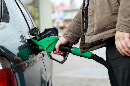 petrol pollution - Refilling Car at Gas Station Stock Photo - Budget Royalty-Free & Subscription, Code: 400-06076866