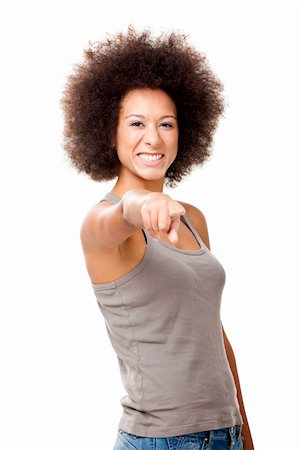 Happy Afro-American young woman isolated on white looking and pointing to the camera Stock Photo - Budget Royalty-Free & Subscription, Code: 400-06077580