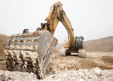 simsearch:700-05662628,k - excavator at a construction site Stock Photo - Budget Royalty-Free & Subscription, Code: 400-06077662