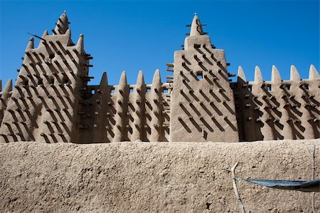 The Great Mosque of Djenné is the largest mud brick or adobe building in the world and is considered to be the greatest achievement of the Sudano-Sahelian architectural style. Stock Photo - Budget Royalty-Free & Subscription, Code: 400-06079841