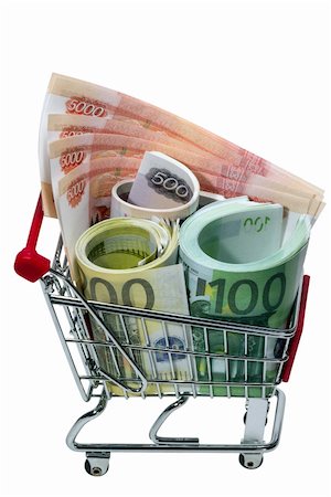 simsearch:400-04012842,k - Shopping Cart with money isolated on white background Stock Photo - Budget Royalty-Free & Subscription, Code: 400-06070278