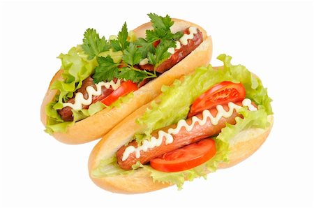 simsearch:400-04587885,k - Two tasty and delicious hotdog. Isolated on white. Stock Photo - Budget Royalty-Free & Subscription, Code: 400-06070297