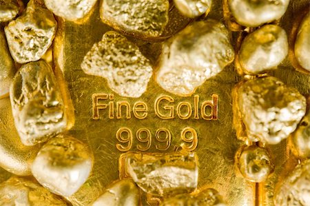 shiny gold bars - fine gold ingots and nuggets. Stock Photo - Budget Royalty-Free & Subscription, Code: 400-06072807
