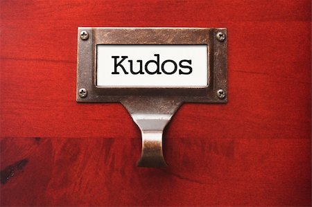 simsearch:400-06072564,k - Lustrous Wooden Cabinet with Kudos File Label in Dramatic LIght. Stock Photo - Budget Royalty-Free & Subscription, Code: 400-06072944