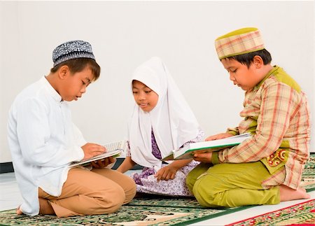 students reading in groups - Muslim children reading Holy Koran Stock Photo - Budget Royalty-Free & Subscription, Code: 400-06085651