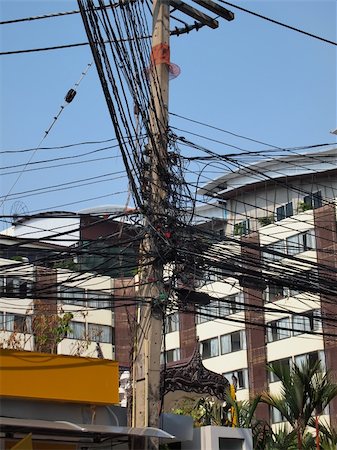 Photo of chaotic wire communications in Thailand Stock Photo - Budget Royalty-Free & Subscription, Code: 400-06088570