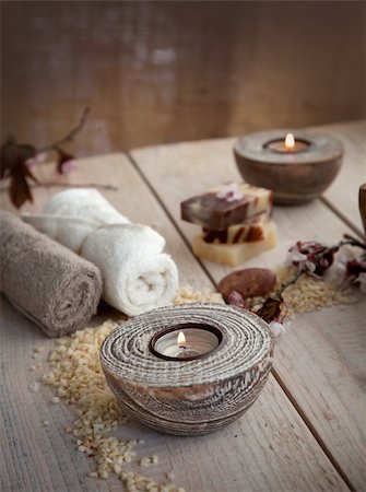 spa water background pictures - Spa and wellness setting with natural soap, candles and towel. Beige dayspa nature set Stock Photo - Budget Royalty-Free & Subscription, Code: 400-06088674