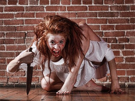 Woman in Horror Situation With Bloody Face Stock Photo - Budget Royalty-Free & Subscription, Code: 400-06082832