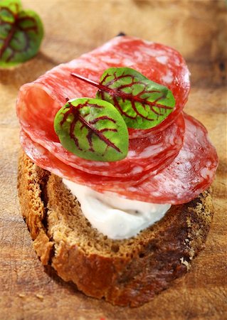 Canape with cream cheese, salami and herbs Stock Photo - Budget Royalty-Free & Subscription, Code: 400-06082980