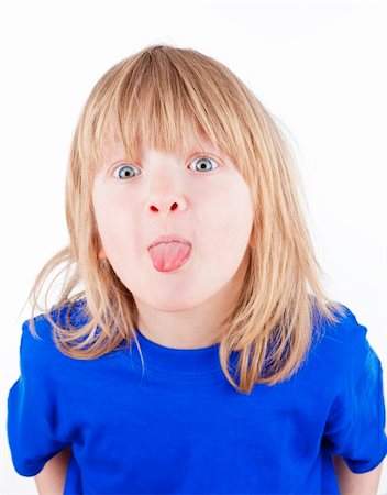 sticking out her tongue - boy with long blond hair sticking out his tongue - isolated on white Stock Photo - Budget Royalty-Free & Subscription, Code: 400-06083388